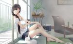  1girl bare_shoulders barefoot black_eyes black_hair cat cellphone cup hair_over_shoulder highres indoors kikivi long_hair mug open_door original phone shorts sitting smartphone solo 