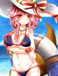  1girl absurdres animal_ears bikini blue_bikini blush breast_hold breasts cleavage collarbone crossed_arms ears_through_headwear fate/extra fate/grand_order fate_(series) fox_ears fox_tail groin hat highres large_breasts long_hair looking_at_viewer navel ocean open_mouth outdoors pink_hair sana_hamada solo swimsuit tail tamamo_(fate)_(all) tamamo_no_mae_(swimsuit_lancer)_(fate) yellow_eyes 