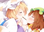  2girls blonde_hair blush brown_hair chen closed_eyes food hand_holding hat highres japa mob_cap multiple_girls pillow_hat pocky pocky_kiss shared_food touhou white_background yakumo_ran 