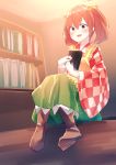  1girl apron bangs bell blush book boots brown_boots brown_eyes brown_hair checkered checkered_kimono eyebrows_visible_through_hair full_body hair_bell hair_ornament highres holding holding_book japanese_clothes kimono kisamu_(ksmz) long_sleeves looking_at_viewer motoori_kosuzu open_mouth shelf sitting solo touhou twintails wide_sleeves yellow_apron 