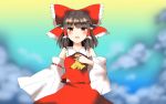  1girl :d ascot bare_shoulders blurry blush bow chocolate_hair commentary depth_of_field detached_sleeves hair_bow hair_tubes hakurei_reimu large_bow looking_at_viewer medium_hair open_mouth red_eyes skirt skirt_set smile solo touhou vest yururi_nano 