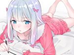  1girl ama_mitsuki ass bangs barefoot blue_eyes blush bow breasts closed_mouth commentary_request downblouse eromanga_sensei eyebrows_visible_through_hair feet_up hair_bow holding izumi_sagiri long_hair looking_at_viewer low-tied_long_hair lying on_bed on_stomach pajamas pink_bow pink_pajamas pink_shorts shiny shiny_hair shorts silver_hair small_breasts solo stylus tablet 