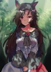  1girl animal_ears asuzemu breasts brooch brown_hair collarbone dappled_sunlight day dress forest imaizumi_kagerou jewelry large_breasts leaf long_sleeves looking_at_viewer nature outdoors plant red_eyes shade solo sunlight touhou tree tree_shade wide_sleeves wolf_ears 