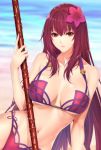  1girl arm_support beach bikini breasts collarbone cover day fate/grand_order fate_(series) flower hair_between_eyes hair_flower hair_intakes hair_ornament holding holding_weapon large_breasts lips long_hair looking_at_viewer lying navel on_side parted_lips pink_bikini purple_hair red_eyes sand scathach_(fate/grand_order) scathach_(swimsuit_assassin)_(fate) solo swimsuit weapon zucchini 
