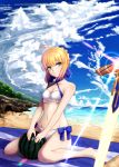  1girl ahoge artoria_pendragon_(swimsuit_archer)_(fate) bare_shoulders beach beach_towel bikini blonde_hair blush breasts cleavage clouds excalibur fate/grand_order fate/stay_night fate_(series) food fruit green_eyes groin hair_ribbon highres looking_at_viewer navel ocean planted_sword planted_weapon ribbon saber short_hair sitting sky small_breasts smile solo swimsuit sword towel wariza water watermelon weapon white_bikini yukidaifuku 