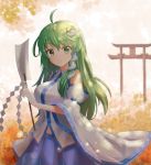  1girl ahoge blue_skirt blush breasts eyebrows_visible_through_hair frog_hair_ornament green_eyes green_hair hair_ornament hair_tubes highres kochiya_sanae large_breasts long_hair looking_at_viewer parted_lips skirt smile solo torii touhou youl 