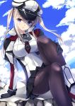  1girl arm_support between_breasts black_gloves black_legwear black_skirt blonde_hair blue_eyes breasts capelet gloves graf_zeppelin_(kantai_collection) hand_on_leg hat highres iron_cross jacket kantai_collection kobayashi_chisato large_breasts long_hair long_sleeves looking_at_viewer military military_uniform necktie pantyhose peaked_cap pleated_skirt red_necktie sidelocks skirt solo uniform white_jacket 