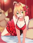  1girl ahoge arm_support bare_shoulders bed blonde_hair blush breasts cleavage collarbone dress eyebrows_visible_through_hair fang fate/extra fate/grand_order fate_(series) flower green_eyes hair_between_eyes hair_flower hair_intakes hair_ornament highres looking_at_viewer medium_breasts nebusoku on_bed open_mouth pillow red_dress saber_extra sleeveless sleeveless_dress solo stuffed_toy v_arms 