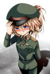  1girl blonde_hair blue_eyes blush closed_mouth colored_eyelashes commentary_request cowboy_shot eyebrows eyebrows_visible_through_hair flat_chest frown hair_between_eyes hal_(goshujinomocha) hat highres long_sleeves looking_at_viewer military military_hat military_uniform peaked_cap short_hair solo standing sweatdrop tagme tanya_degurechaff uniform youjo_senki 