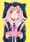  2016 animal_hood artist_name bangs black_hoodie blurry_vision cat_hood dangan_ronpa expressionless game_console hair_flaps handheld_game_console highres hood hoodie looking_at_viewer nanami_chiaki neck_ribbon parted_bangs parted_lips pink_eyes pink_hair playstation_portable ribbon school_uniform super_dangan_ronpa_2 triangles upper_body yellow_background yennineii 