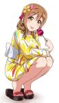  1girl :p bangs blush braid brown_eyes brown_hair candy_apple commentary_request flower food hair_flower hair_ornament highres japanese_clothes kanzashi kimono kunikida_hanamaru legs_together long_sleeves looking_at_viewer love_live! love_live!_sunshine!! nail_polish obi pink_nails sandals sash simple_background smile solo squatting tiptoes toenail_polish toes tongue tongue_out twin_braids white_background yopparai_oni 