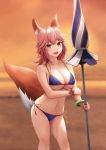  1girl animal_ears beach_umbrella blush bracelet breasts cleavage closed_umbrella collarbone eyebrows_visible_through_hair fate_(series) fou_zi fox_ears fox_tail highres holding holding_umbrella jewelry large_breasts looking_at_viewer navel open_mouth pink_hair smile solo tail tamamo_(fate)_(all) tamamo_no_mae_(swimsuit_lancer)_(fate) teeth umbrella 
