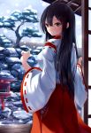  1girl black_hair breasts brown_eyes hakama highres japanese_clothes long_hair miko nicoby original porch red_hakama ribbon-trimmed_sleeves ribbon_trim smile snow solo veranda wide_sleeves 