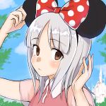  1girl bow brave_witches brown_eyes castle disney disneyland edytha_rossmann emirio110 emirio_(user_wmup5874) highres looking_at_viewer minnie_mouse_ears polka_dot polka_dot_bow silver_hair solo world_witches_series 