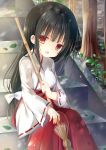  1girl :d bamboo_broom bangs black_hair blunt_bangs blush bow broom commentary_request day eyebrows_visible_through_hair eyes_visible_through_hair hair_bow hakama head_tilt holding holding_broom japanese_clothes leaf long_hair long_sleeves looking_at_viewer low-tied_long_hair miko moss open_mouth original outdoors red_hakama red_ribbon ribbon ribbon-trimmed_sleeves ribbon_trim shiiba_nae sitting sitting_on_stairs smile solo stairs stone_stairs sunlight tareme tree very_long_hair white_bow wide_sleeves 