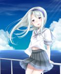  1girl asymmetrical_bangs bangs baretto_(firearms_1) blue_hairband blue_sky blush clouds commentary_request day grey_skirt hairband headband kantai_collection long_hair looking_at_viewer ocean outdoors pleated_skirt sagiri_(kantai_collection) sailor_collar school_uniform serafuku short_sleeves silver_hair skirt sky smile solo swept_bangs violet_eyes water 