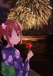  1girl aerial_fireworks blush brown_hair candy_apple city_lights cityscape expressionless fireworks floral_print flower food hair_flower hair_ornament japanese_clothes kimono kumatsugawa looking_at_viewer looking_back night obi original outdoors red_eyes sash short_hair side_ponytail sidelocks smoke solo upper_body water yukata 