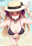  1girl arms_up beach bikini black_bikini blonde_hair blush bow bracelet breasts cleavage earrings ereshkigal_(fate/grand_order) fate/grand_order fate_(series) foreshortening from_above hair_bow hands_on_headwear hat hat_ribbon jewelry large_breasts legs_crossed long_hair looking_at_viewer miyamoto_issa navel necklace outdoors parted_lips pink_eyes ribbon skull_necklace smile solo string_bikini sun_hat sweat swimsuit tohsaka_rin two_side_up 