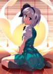  1girl backlighting bangs between_legs black_bow black_bowtie black_legwear blue_eyes blue_skirt bow bowtie closed_mouth expressionless eyebrows_visible_through_hair from_side full_body hair_bow hand_between_legs hand_on_own_arm highres kneehighs konpaku_youmu konpaku_youmu_(ghost) looking_at_viewer no_shoes pleated_skirt puffy_short_sleeves puffy_sleeves sazanami_mio shadow shirt short_hair short_sleeves sitting skirt skirt_set solo touhou wariza white_hair white_shirt wooden_floor 