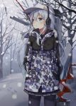  1girl auger bangs bare_tree black_legwear blue_eyes bucket camouflage camouflage_jacket commentary cowboy_shot earmuffs flat_cap fur_trim hair_between_eyes hands_in_pocket hat hibiki_(kantai_collection) highres holding huwali_(dnwls3010) kantai_collection long_hair looking_to_the_side miniskirt outdoors pantyhose pleated_skirt revision rigging silver_hair skirt snow solo standing tree verniy_(kantai_collection) 