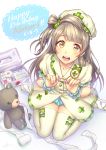  1girl blush bow brown_eyes brown_hair character_name dated english eyebrows_visible_through_hair green_bow hair_bow happy_birthday highres long_hair looking_at_viewer love_live! love_live!_school_idol_project minami_kotori open_mouth signature smile solo stuffed_animal stuffed_toy teddy_bear thigh-highs wedo white_legwear 
