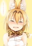  1girl animal_ears bare_shoulders blonde_hair blush bow bowtie closed_eyes crying elbow_gloves extra_ears facing_viewer gloves hair_between_eyes highres kemono_friends medium_hair print_neckwear serval_(kemono_friends) serval_ears serval_print shirt simple_background sleeveless sleeveless_shirt solo tears translated upper_body white_shirt yasume_yukito yellow_background 