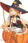  1girl blonde_hair breasts candy cleavage cloak food green_eyes halloween hat highres kimura_(ykimu) long_hair looking_at_viewer mismatched_legwear necktie one_eye_closed open_mouth original simple_background sitting solo striped striped_legwear thigh-highs witch_hat 