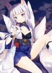  1girl :o animal_ears azur_lane bangs blue_eyes blue_skirt blunt_bangs blush breasts fox_ears fox_girl fox_mask fox_tail hakama_skirt hand_up highres holding holding_mask japanese_clothes kaga_(azur_lane) knee_up kneehighs kyuubi mask medium_breasts multiple_tails open_mouth pleated_skirt shiino_sera short_hair sidelocks silver_hair sitting skirt solo tail white_legwear 