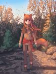  1girl animal_ears aposine arms_at_sides autumn capelet capri_pants forest full_body hair_blowing highres holo loafers long_hair long_sleeves looking_at_viewer nature outdoors pants red_eyes redhead sash scarf shadow shoes sidelocks smile solo spice_and_wolf tail tree twilight walking wind wolf_ears wolf_tail 