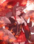  1girl absurdres akagi_(azur_lane) animal_ears autumn_leaves azur_lane bare_shoulders black_gloves breasts brown_hair cleavage commentary_request eyeshadow fox_ears fox_tail gloves hair_tubes highres large_breasts long_hair looking_at_viewer makeup miyuki_(miyuki0529) multiple_tails oriental_umbrella parted_lips pleated_skirt red_eyes skirt smile solo standing tail umbrella 