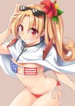  1girl american_flag_bikini anchor azur_lane bikini blonde_hair brown_background capelet cleveland_(azur_lane) cowboy_shot eyepatch_bikini eyewear_on_head flag_print flower grin hair_flower hair_ornament hibiscus highres long_hair ponytail red_eyes side-tie_bikini simple_background smile solo swimsuit wapokichi white_capelet 