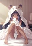  1girl blanket blush clock closed_mouth dark_skin embarrassed facepaint facial_mark fate/grand_order fate_(series) indoors jackal_ears knees_up lamp naked_sheet nitocris_(fate/grand_order) nitocris_(swimsuit_assassin)_(fate) nose_blush nude on_bed ouka_(ra-raradan) purple_hair sitting solo thighs violet_eyes 