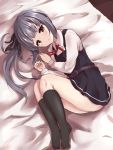  1girl asymmetrical_hair bangs bare_legs bed_sheet belt black_dress black_legwear black_ribbon blunt_bangs blush brown_eyes collared_shirt commentary_request dress from_above full_body hair_ribbon highres kantai_collection kasumi_(kantai_collection) kneehighs long_hair long_sleeves looking_at_viewer lying neck_ribbon no_shoes on_bed on_side panties parted_lips pinafore_dress red_ribbon ribbon shirt side_ponytail silver_hair solo soramuko underwear white_panties white_shirt wing_collar 