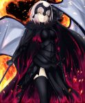  1girl absurdres armor bangs black_cape black_legwear blonde_hair breasts bullseye1203 cape commentary_request cowboy_shot embers fate_(series) fire fur_collar fur_trim gauntlets headpiece highres holding holding_weapon jeanne_alter looking_away parted_lips ruler_(fate/apocrypha) sheath short_hair side_slit smile standing sword teeth thigh-highs vambraces weapon 