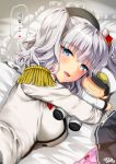  1girl admiral_(kantai_collection) bangs bed_sheet beret black_hat black_skirt blue_eyes blush breasts character_doll epaulettes eyebrows_visible_through_hair hat holding_doll jacket kantai_collection kashima_(kantai_collection) kojima_saya long_hair long_sleeves looking_at_viewer medium_breasts on_bed open_mouth panties panties_removed pillow pink_panties pleated_skirt silver_hair skirt skirt_removed solo translation_request twintails underwear white_jacket 