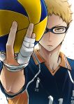  1boy ball bandage bandaged_hands blonde_hair blue-framed_eyewear clothes_writing colored_eyelashes commentary_request fingernails foreshortening glasses haikyuu!! hand_up holding holding_ball looking_at_viewer male_focus serious simple_background sportswear sweat tsukishima_kei upper_body volleyball volleyball_uniform white_background wing_collar yellow_eyes 