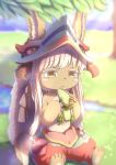  1girl absurdres animal_ears bangs blue_sky blurry blurry_background closed_mouth commentary_request day depth_of_field eyebrows_visible_through_hair grass hat highres holding holding_stuffed_animal horns long_hair made_in_abyss multicolored_pants nanachi_(made_in_abyss) on_grass outdoors pants puffy_pants ray_(pixiv9514208) sitting sky solo stuffed_animal stuffed_toy tail very_long_hair white_hair yellow_eyes 