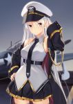  1girl aircraft airplane arm_up azur_lane bangs black_neckwear blush breasts closed_mouth coat cowboy_shot enterprise_(azur_lane) grey_legwear hand_on_hip hat highres jun_project large_breasts looking_at_viewer military military_uniform miniskirt necktie open_clothes open_coat peaked_cap pleated_skirt revision silver_hair skirt solo thigh-highs uniform violet_eyes zettai_ryouiki 