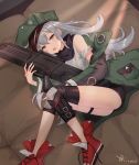  1girl armband assault_rifle bare_shoulders bed brown_eyes g11 g11_(girls_frontline) girls_frontline grey_hair gun hair_between_eyes hat jacket karimo/konchi knee_pads long_hair looking_at_viewer lying object_hug on_bed on_side open_mouth rifle scarf shoes shorts solo tank_top thigh_strap weapon 