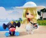  1girl bag beach blonde_hair blue_sky braid chibi clouds commentary_request cosplay dress figure full_body garchomp hair_over_one_eye hat lillie_(pokemon) lillie_(pokemon)_(cosplay) long_hair outdoors photo pokemoa pokemon pokemon_(game) pokemon_sm shirona_(pokemon) sky smile toy twin_braids 