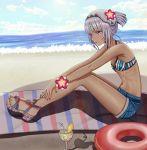  1girl altera_(fate) bangs bare_arms bare_legs bare_shoulders beach beach_towel bikini_top black_nails blue_sky blunt_bangs blurry blurry_background breasts cleavage clouds cup cutoffs dark_skin day denim denim_shorts depth_of_field drinking_glass drinking_straw fate/extella fate/extra fate_(series) flower food forehead_protector from_side fruit full_body hair_flower hair_ornament horizon innertube leaning_forward legs_apart lemon lemon_slice lens_flare_abuse long_hair nail_polish navel ocean outdoors own_hands_together red_eyes sandals shore short_ponytail short_shorts shorts silver_hair sitting sky small_breasts solo sparkle striped_bikini_top thighs toenail_polish towel water wrist_flower 