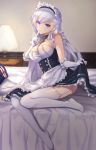  1girl apron azur_lane bed bed_sheet belfast_(azur_lane) blue_eyes blurry braid breasts chains cleavage collar commentary_request depth_of_field desk_lamp dress dress_lift elbow_gloves french_braid garter_straps gloves head_tilt highres index_finger_raised kon_(k0n16) lamp lifted_by_self long_hair looking_at_viewer maid maid_apron maid_headdress silver_hair sitting smile solo white_gloves white_legwear 
