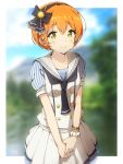  1girl black_neckwear blurry bow bracelet buttons commentary_request depth_of_field dress hair_bow hairband hands_together highres hoshizora_rin jewelry looking_at_viewer love_live! love_live!_school_idol_festival love_live!_school_idol_project neckerchief orange_hair outdoors sailor_collar sailor_dress senguyen1011 short_hair short_sleeves solo striped_sleeves yellow_eyes 