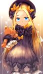  1girl abigail_williams_(fate/grand_order) bangs black_bow black_dress black_hat blonde_hair bloomers blue_eyes bow butterfly closed_mouth commentary_request cowboy_shot dress eyebrows_visible_through_hair fate/grand_order fate_(series) hair_bow hands_in_sleeves hat head_tilt highres long_sleeves looking_at_viewer object_hug orange_bow parted_bangs polka_dot polka_dot_bow smile solo stuffed_animal stuffed_toy teddy_bear umagenzin underwear white_bloomers 