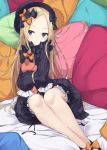  1girl :o abigail_williams_(fate/grand_order) bangs bed_sheet black_bow black_dress black_footwear black_hat bloomers bow butterfly commentary_request dress fate/grand_order fate_(series) hair_bow hands_in_sleeves hat head_tilt highres long_hair long_sleeves looking_at_viewer monobe_tsukuri object_hug orange_bow parted_bangs parted_lips pillow polka_dot polka_dot_bow sitting solo stuffed_animal stuffed_toy teddy_bear underwear very_long_hair white_bloomers 