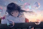  1girl bag bangs blouse blue_eyes blue_hair blue_sky bubble bubble_pipe closed_mouth clouds cloudy_sky crossed_arms eyebrows_visible_through_hair floating_hair holding leaning_on_object long_hair long_sleeves looking_at_viewer original outdoors school_bag shoulder_bag sky solo sousou_(sousouworks) sunset upper_body white_blouse 