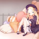  1girl abigail_williams_(fate/grand_order) bangs black_bow black_dress black_footwear black_hat blonde_hair bloomers blue_eyes blush bow butterfly closed_mouth commentary_request dress eyebrows_visible_through_hair fate/grand_order fate_(series) forehead hair_bow hands_in_sleeves hat heart heart_pillow knees_together_feet_apart kotoba_(610430468) long_hair long_sleeves looking_at_viewer mary_janes object_hug orange_bow parted_bangs pigeon-toed pillow polka_dot polka_dot_bow shoes sitting solo stuffed_animal stuffed_toy teddy_bear underwear very_long_hair white_bloomers 