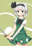  &gt;:) 1girl bangs black_hairband black_neckwear black_ribbon blunt_bangs blush bow bowtie closed_mouth collared_shirt cowboy_shot green_eyes green_skirt green_vest hair_ribbon hairband highres hitodama holding holding_sword holding_weapon katana konpaku_youmu konpaku_youmu_(ghost) looking_at_viewer puffy_short_sleeves puffy_sleeves ribbon ruu_(tksymkw) shirt short_hair short_sleeves silver_hair skirt skirt_set smile solo sword touhou v-shaped_eyebrows vest weapon white_shirt 