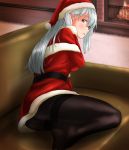  1girl alternate_costume ass belt black_legwear blush closed_mouth coat couch fire fireplace hair_between_eyes hat highres jacket kantai_collection long_hair looking_at_viewer pantyhose red_coat red_hat remodel_(kantai_collection) santa_costume shoukaku_(kantai_collection) silver_hair solo tama_(seiga46239239) yellow_eyes 