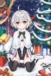  1girl :o ahoge bell black_bikini_top black_gloves black_legwear boots bow box candy candy_cane capelet christmas_tree elbow_gloves fate/grand_order fate_(series) food full_body fur_trim gift gift_box gloves green_ribbon headpiece highres jeanne_d&#039;arc_(fate)_(all) jeanne_d&#039;arc_alter_santa_lily looking_at_viewer pom_pom_(clothes) ribbon shibanme_tekikumo short_hair silver_hair sitting skirt solo striped striped_bow striped_ribbon v_arms wariza white_capelet white_footwear yellow_eyes 